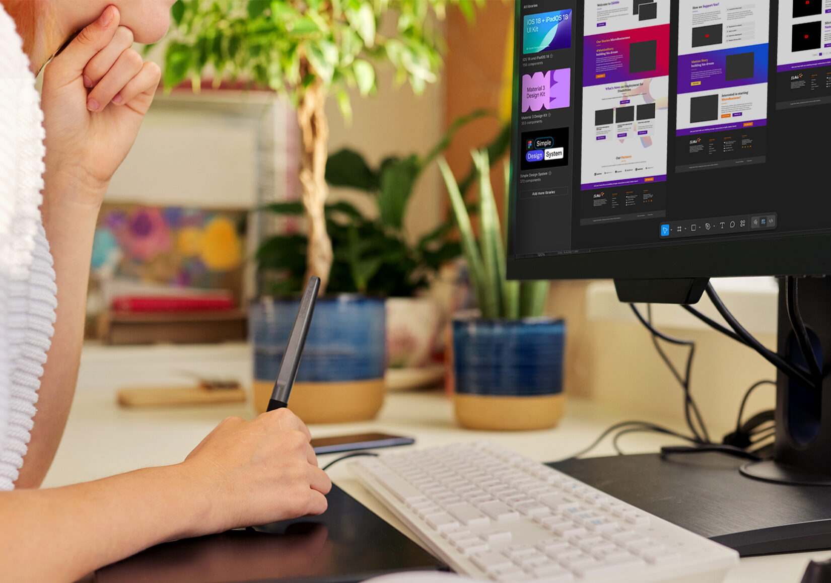 Alicia designing wireframes on computer image